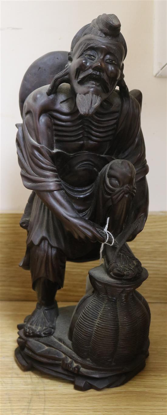 A rootwood carving of a man